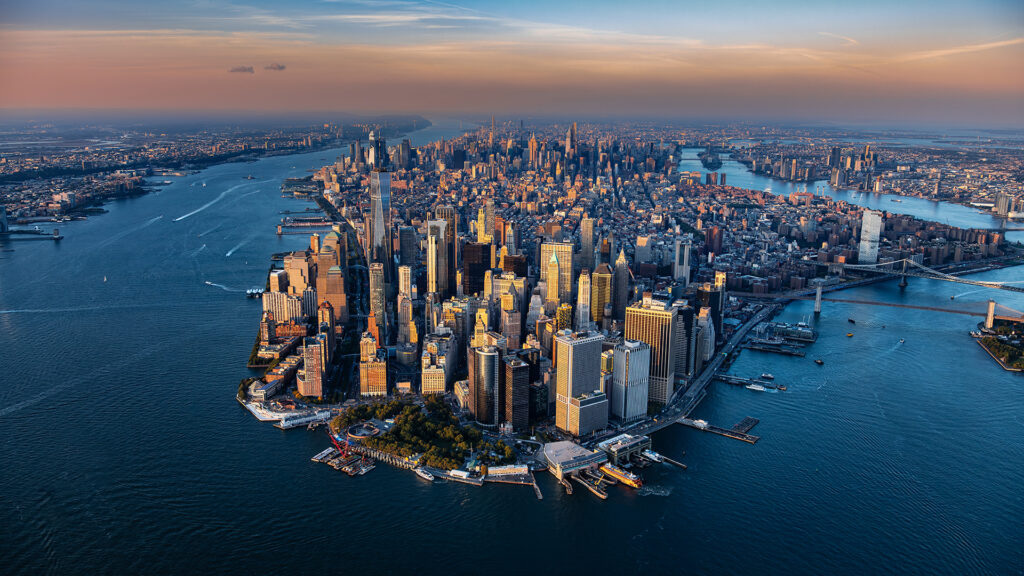 Aerial cityscape of New York City with a view of the entire island of Manhattan.